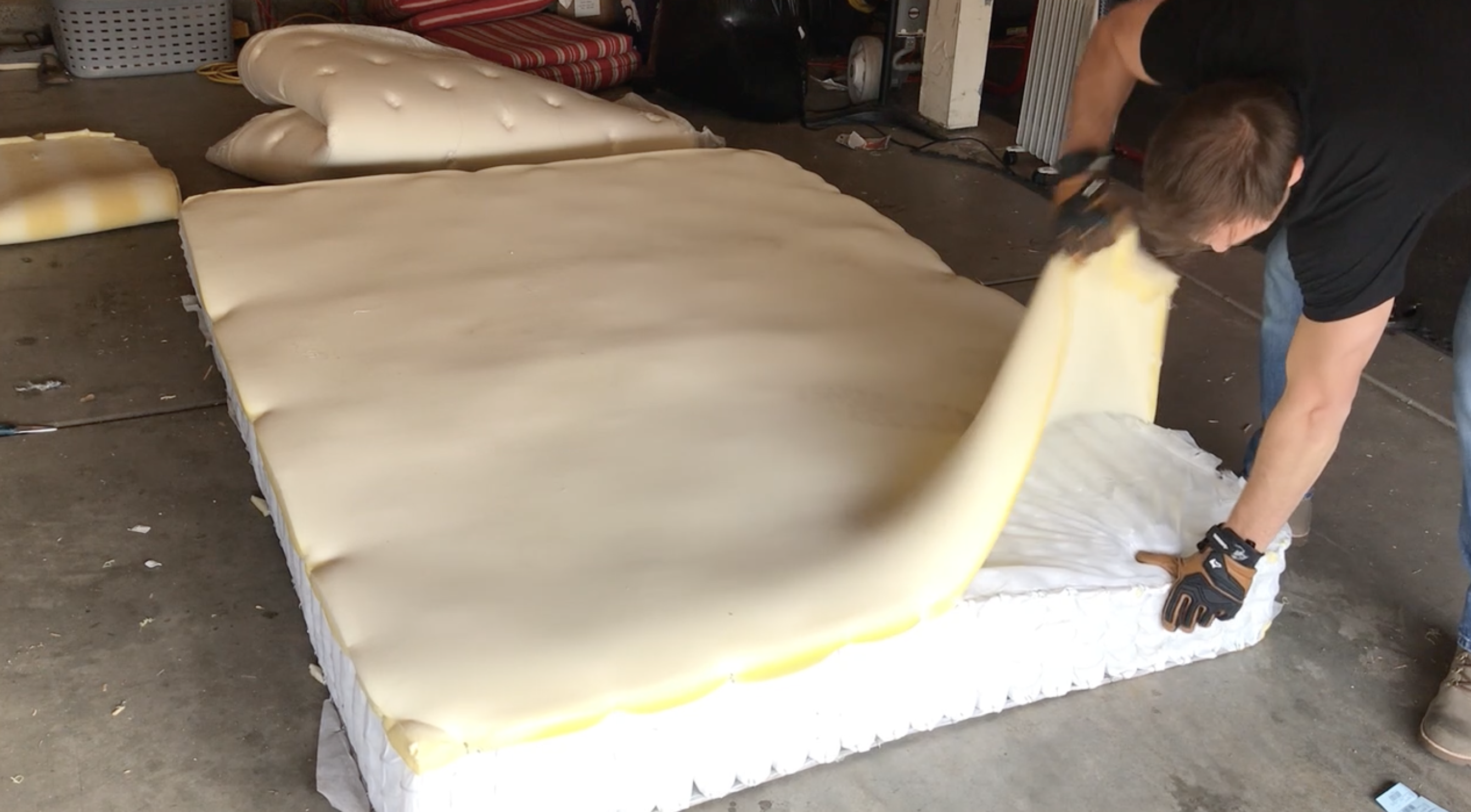 Ripping open old mattress